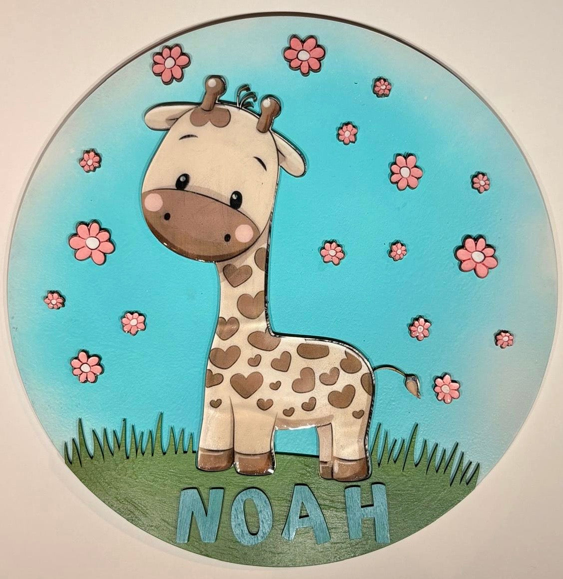 Naambord rond giraffe met letters